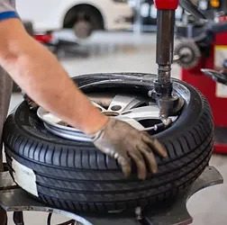 A man working on the tire